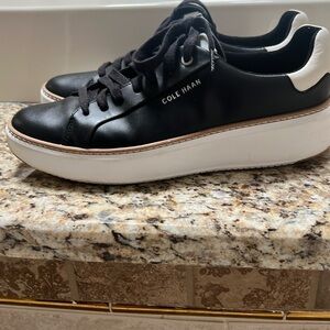 Cole Haan black and white grand 360 tennis shoes